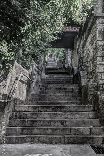 Walkway, steep stairway going up to the Trsat Castle. Rijeka (Fiume), Croatia. HDR technique.
