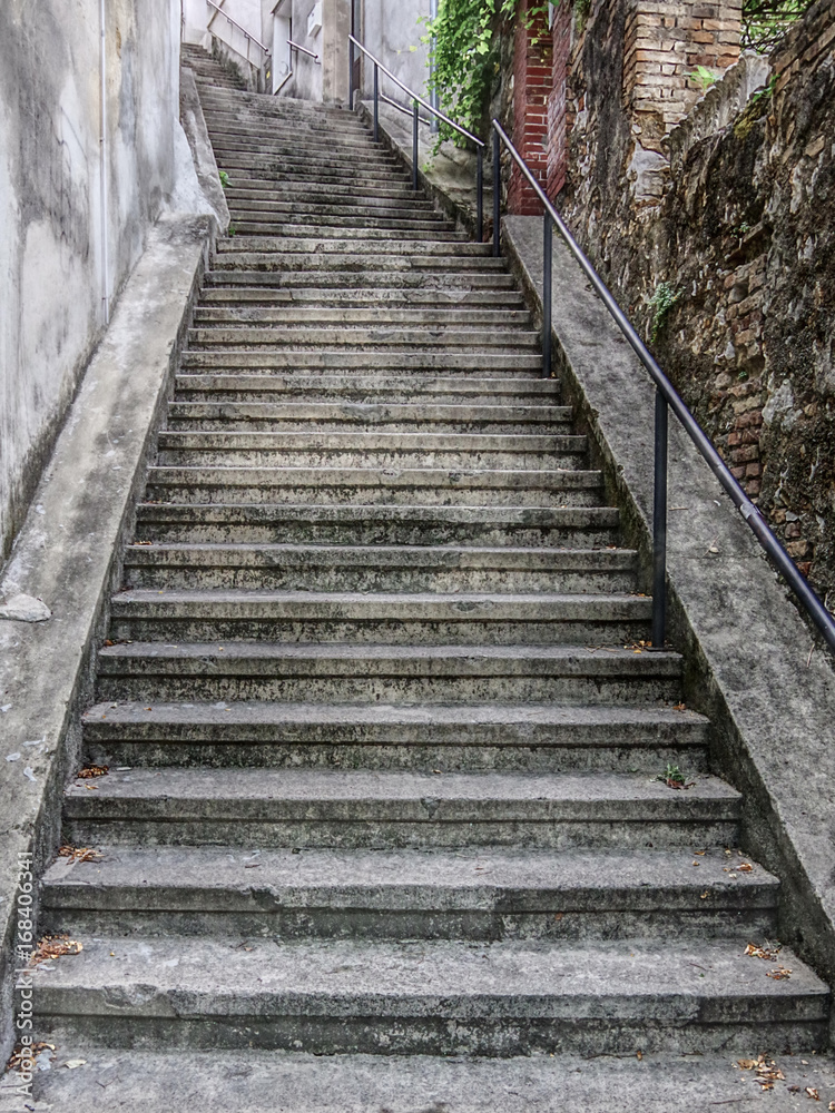 Walkway, steep stairway going up to the Trsat Castle. Rijeka (Fiume), Croatia. HDR technique.