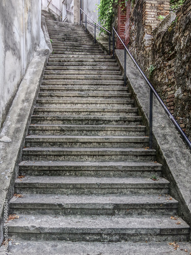 Walkway, steep stairway going up to the Trsat Castle. Rijeka (Fiume), Croatia. HDR technique.
