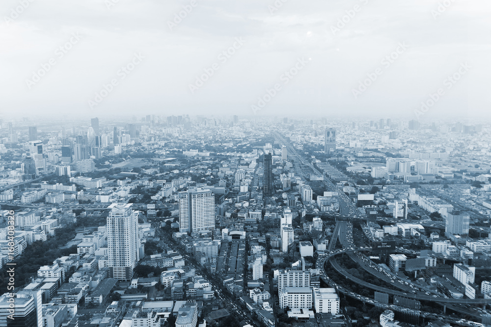 Bangkok cityscape high panorama. High view of buildings, river and traffic.