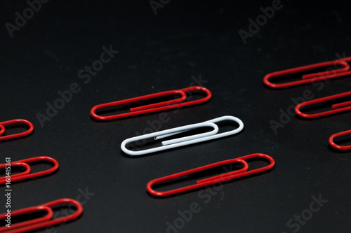 row of paper clip, different concept photo