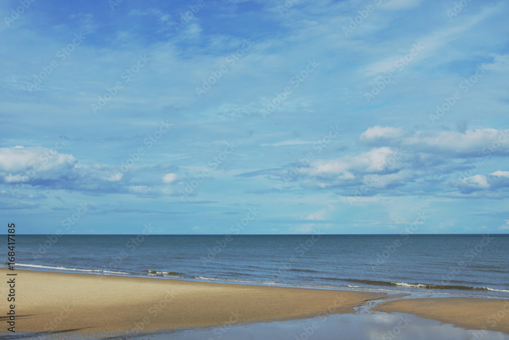 sea sand and water surf to beach in cloudy day