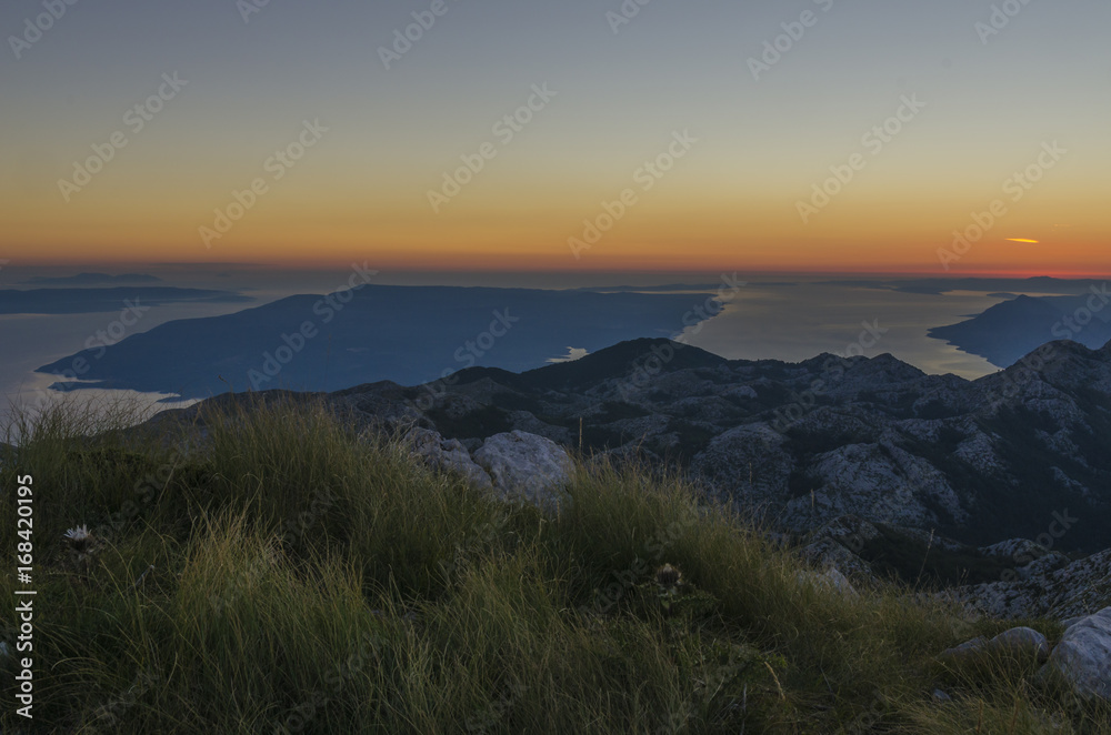 View from the top of Sveti Jure peak in the Biokovo mountains / Croatia. Brac island on the background.