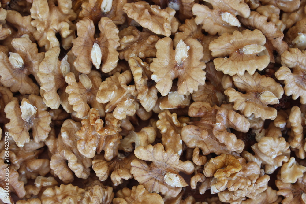 Unshelled walnuts background Unshelled walnuts background