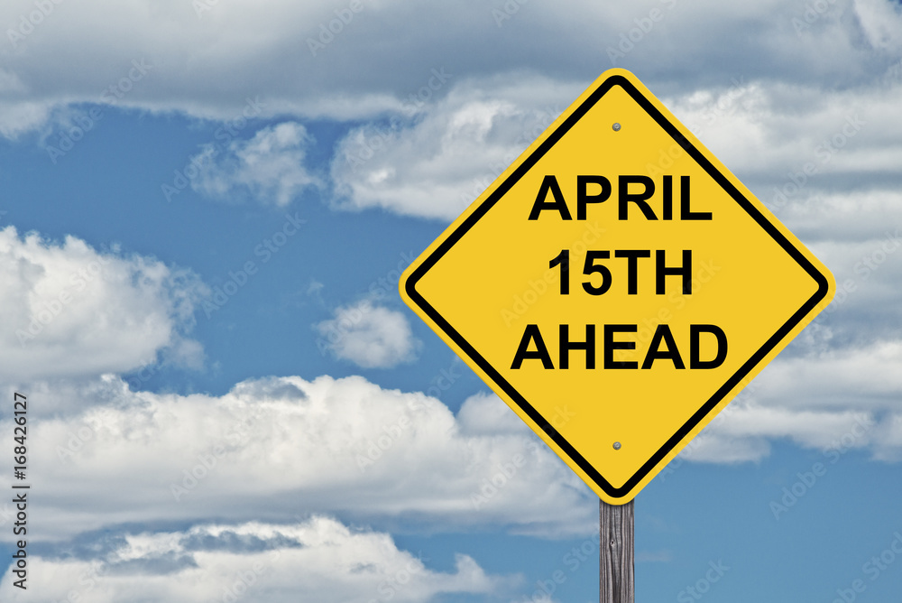 Caution Sign Blue Sky - April 15th Ahead