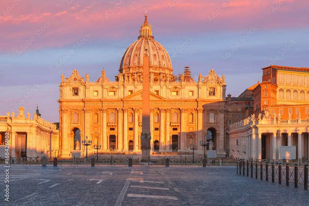 Panoramic view of The Papal Basilica of St. Peter in the Vatican or Saint Peter Cathedral at sunrise in Rome, Italy.
