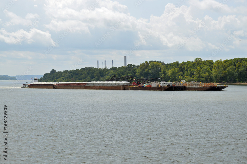 Towboat pushing barges on the river