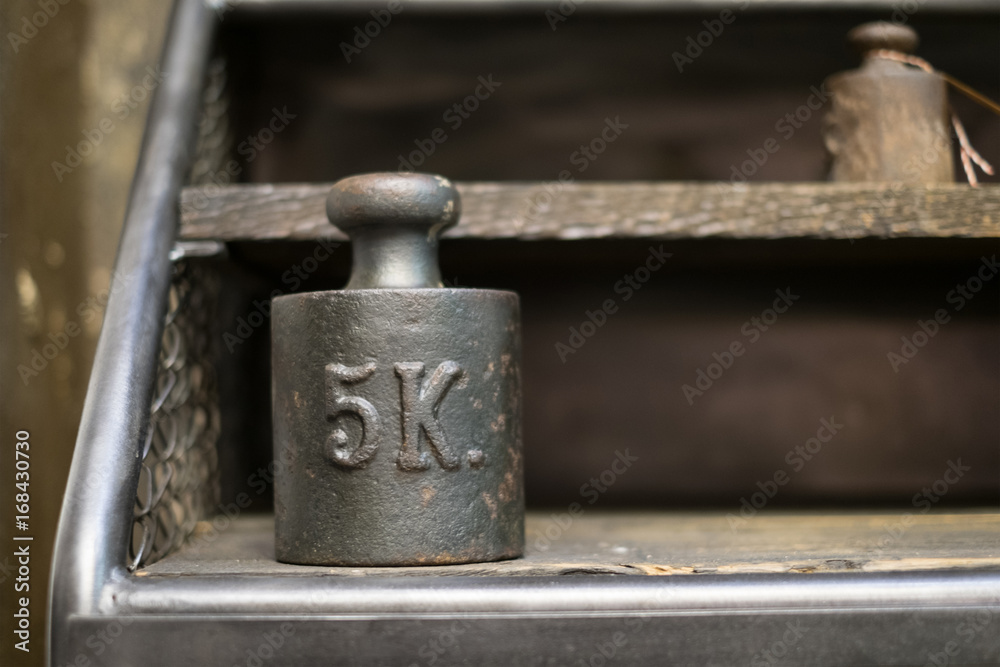 5 kg weights - old 5 kilogram weights on work bench