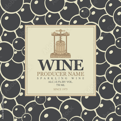 Vector label for sparkling wine with a wine press and barrel in retro style on the background black grapes