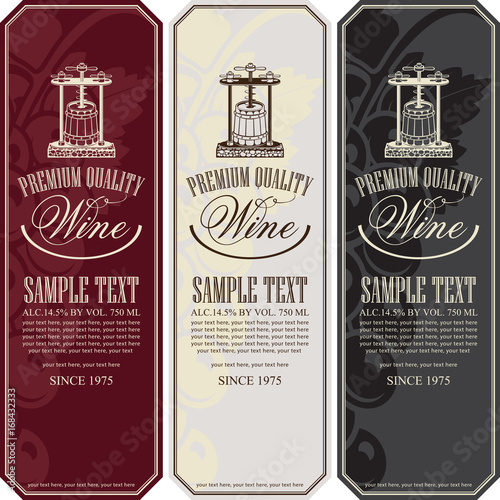 Vector set of three labels for various kinds of wine with vintage wine press, bunch of grapes, calligraphic inscription and place for text