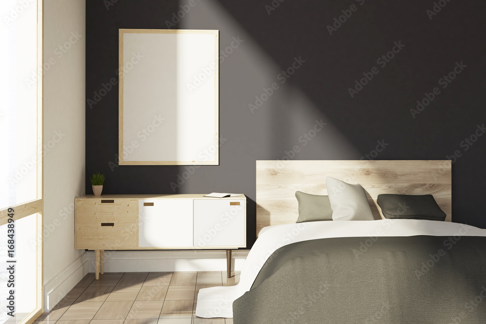 Black bedroom with a vertical poster, gray cover