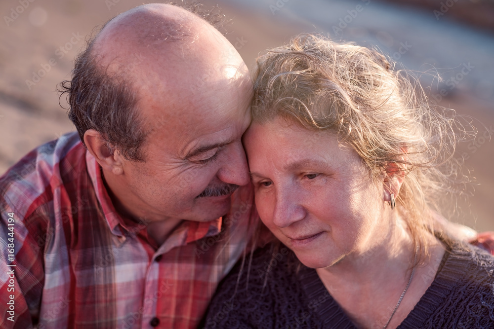 Portrait of a happy romantic couple outdoors. Portrait of a happy romantic couple outdoors.