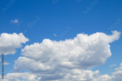 White clouds in blue sky © olyasolodenko