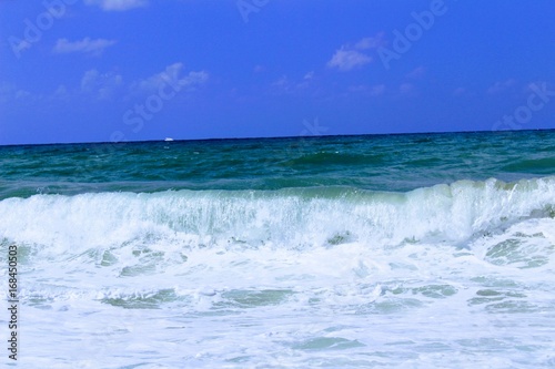 Waves of the Mediterranean Sea are rolling ashore  Alanya  Turkey .