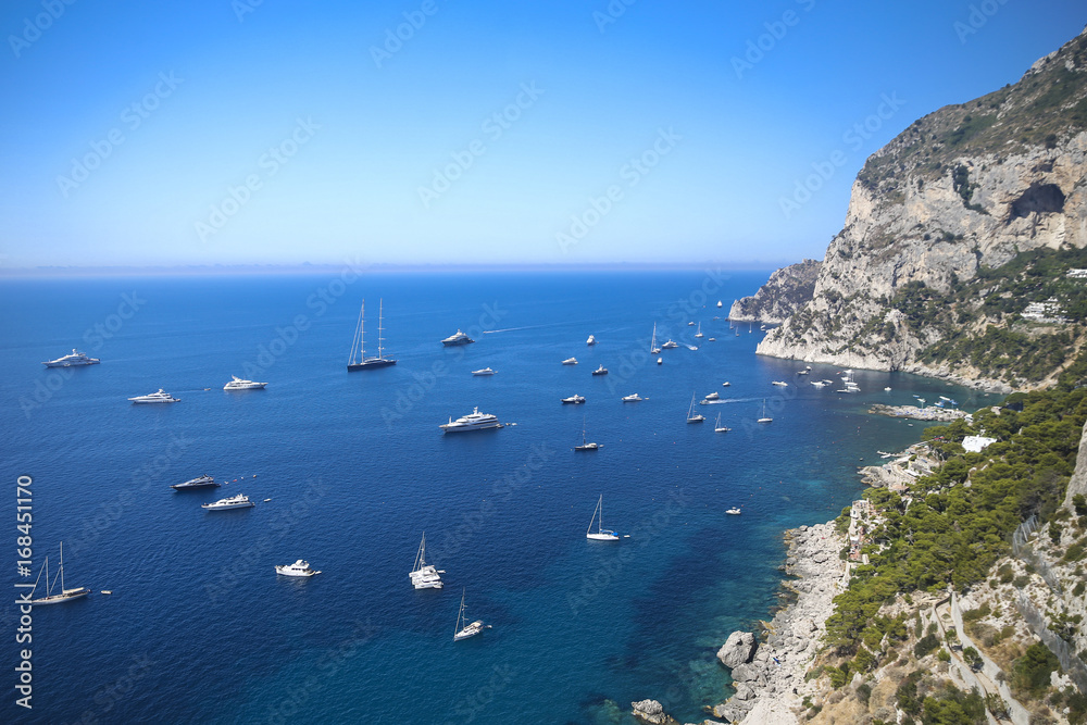 Capri shoreline yachts anchored
