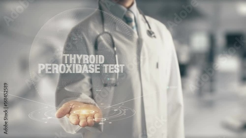 Doctor holding in hand Thyroid Peroxidase Test photo