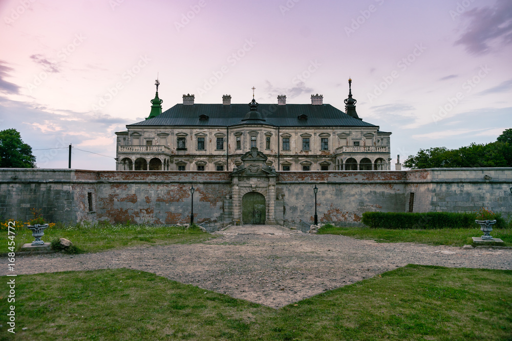 Medieval Pidhirtsi Castleat the evening, Pidhirtsi village, Lviv region, Ukraine Medieval Pidhirtsi Castleat the evening, Pidhirtsi village, Lviv region, Ukraine