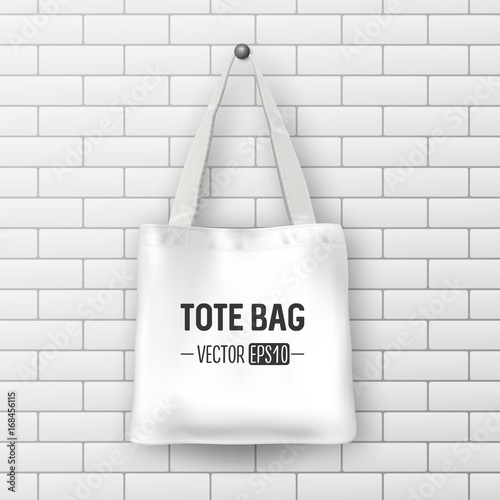 Realistic vector white textile tote bag. Closeup on brick wall background. Design template for branding, mockup. EPS10.