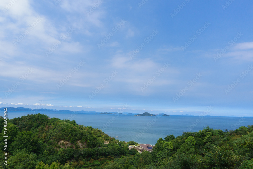 Setonaikai (Seto Inland) Sea and islands under blue sky at Saijo-city in Ehime, Japan