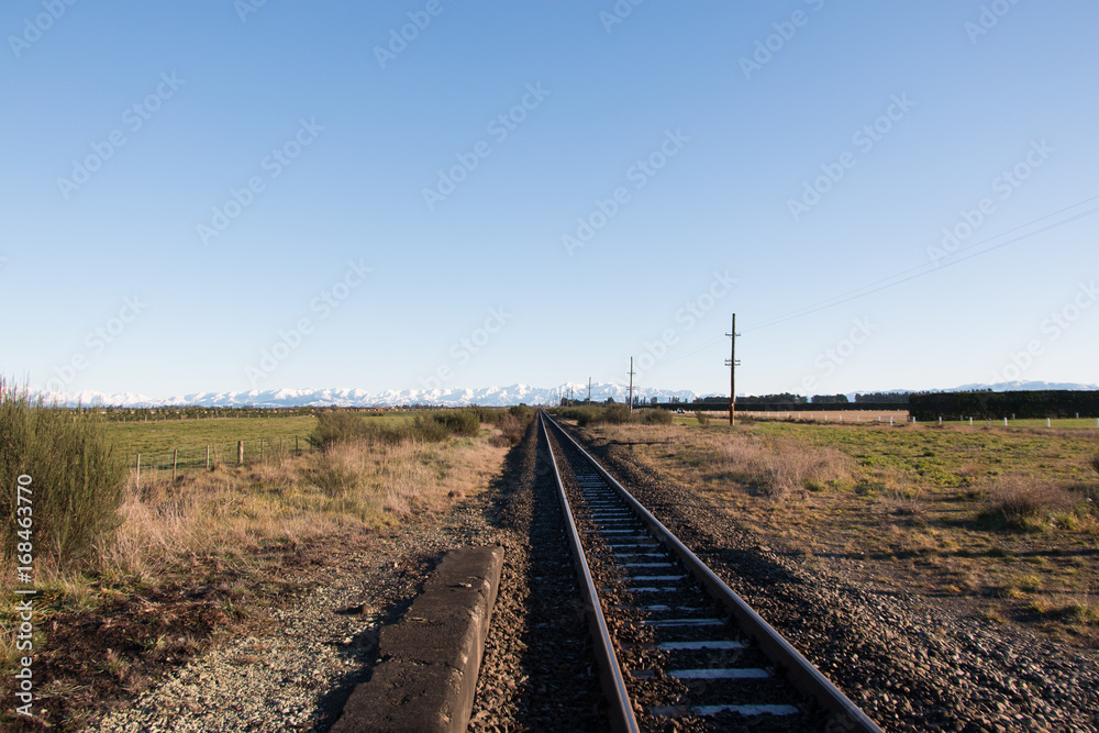 Fototapeta premium Railway and Southern Alps