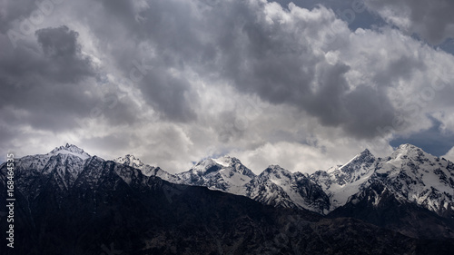 Cloudy sky over the mountain range © jumpscape