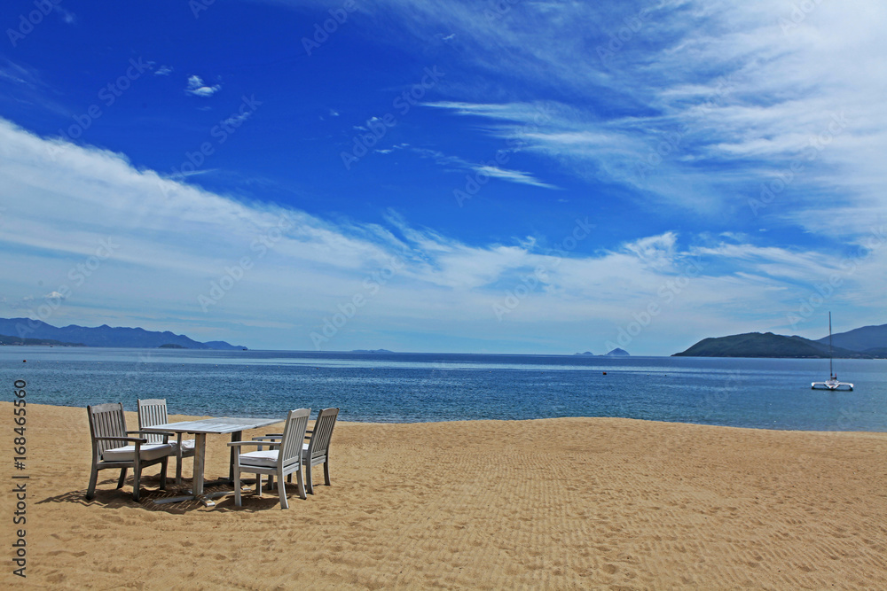 Chairs and table on Nha Trang beach, Vietnam