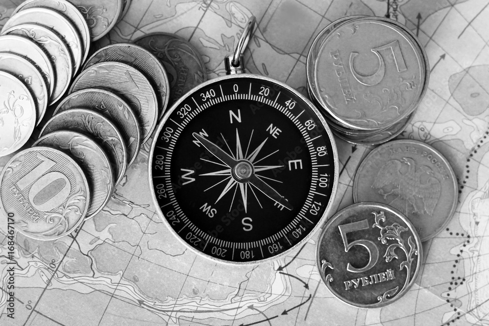 Compass and money on the map,a set of traveler