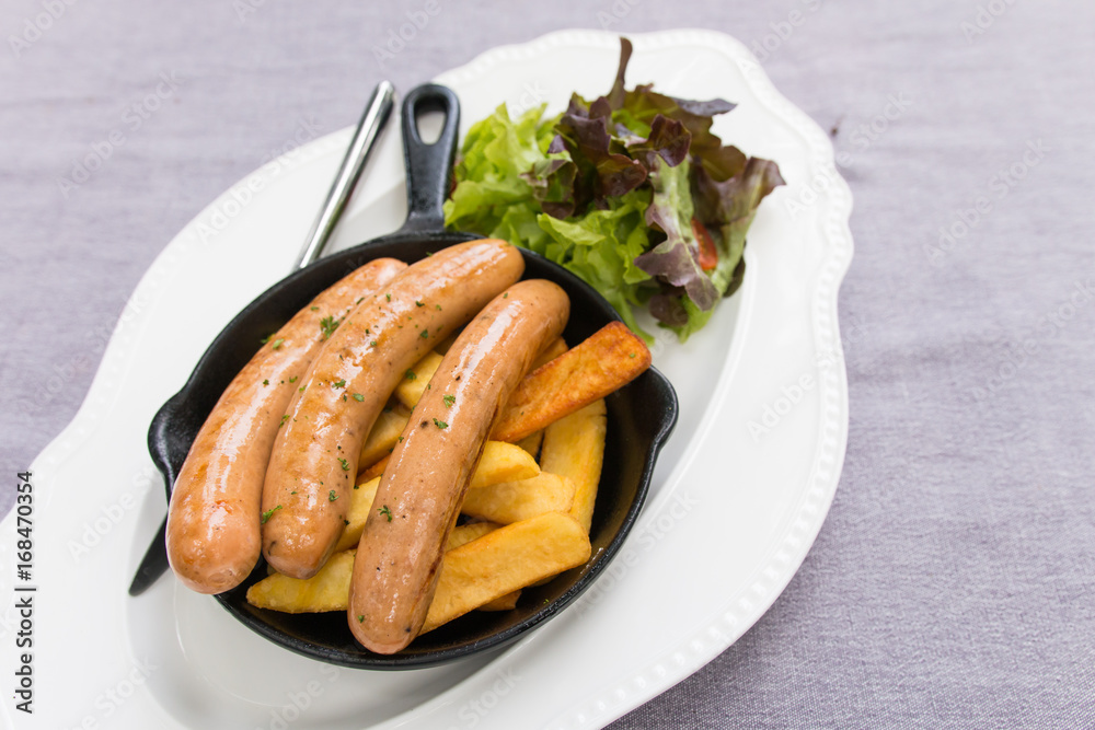 delicious sausages with french fries delicious sausages with french fries