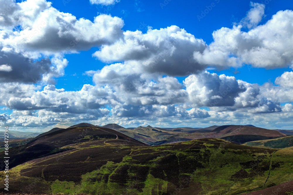 view across the Pentland Hills Scotland with a bright sky view across the Pentland Hills Scotland with a bright sky