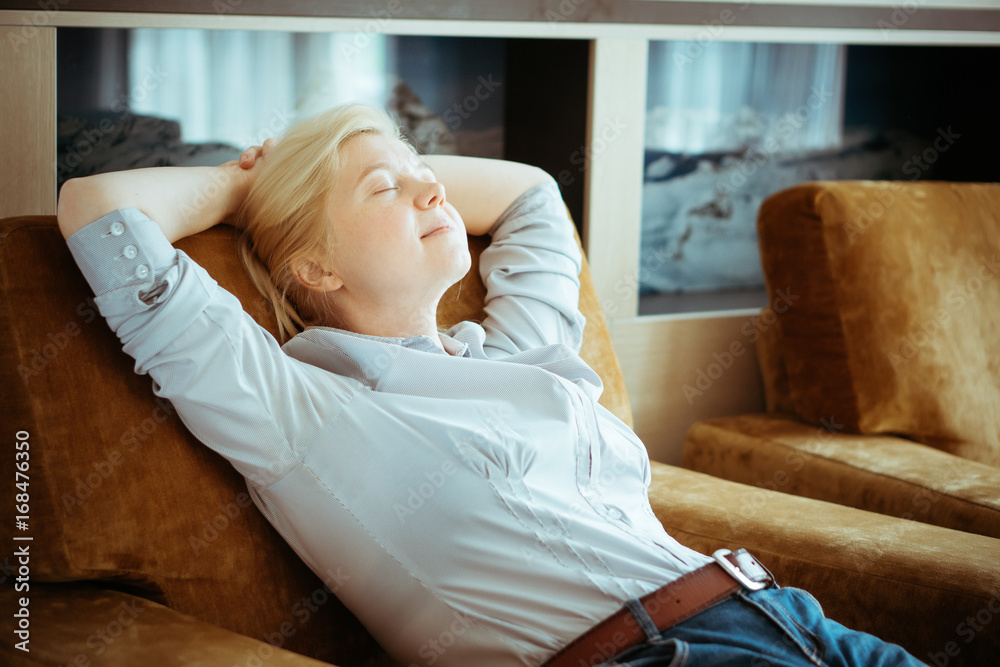 Obraz premium Woman in casual clothes resting at home.
