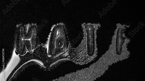 The word Hate is formed from water into ice letters, melting reverse, 4k footage, Timelapse