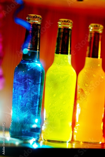 Alcopop Bottles at a party  photo
