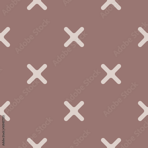 Brown geometric seamless background with crosses