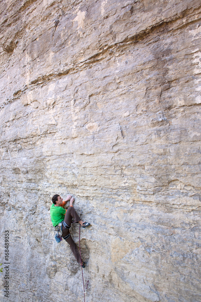 climber climbs the rock..