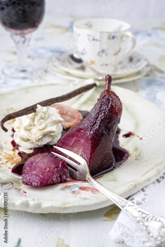 Traditional French poarched pear as close-up on plate