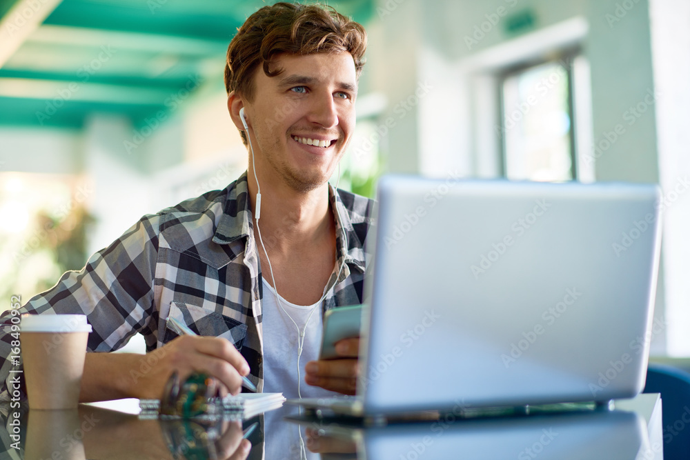 Happy Young Man Working at Creative Office Happy Young Man Working at Creative Office