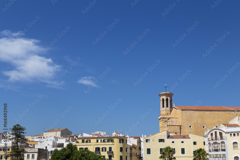 Menorca landmark tower church on a blue sky