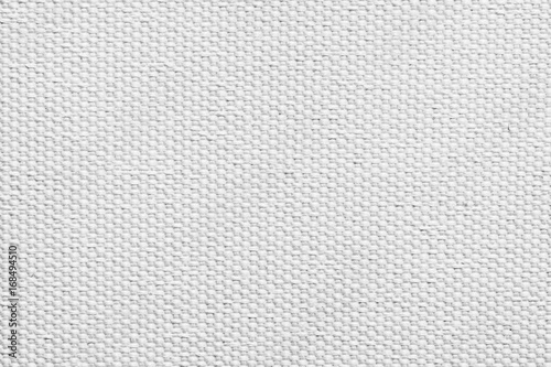 White gray closeup macro photo of detailed canvas fabric pattern background.