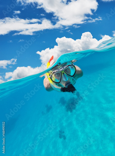 Snorkeling woman exploring beautiful ocean sealife © Jag_cz