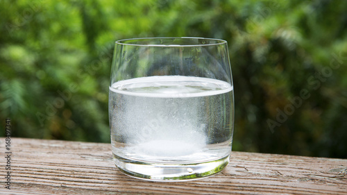 glass of water with effervescent tablet