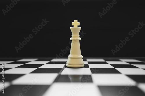 king of the winner on chess board game, competition and strategy concept