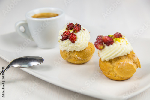 Sicilian pastry and coffee on white dish