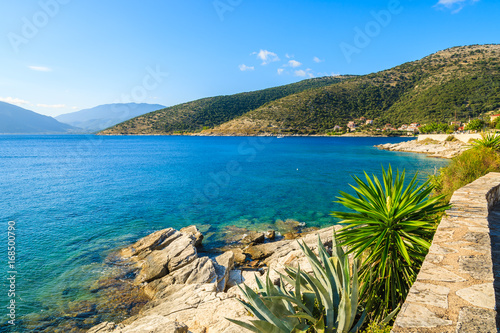 Coastal path with agave plants along sea in Agia Efimia village  Kefalonia island  Greece