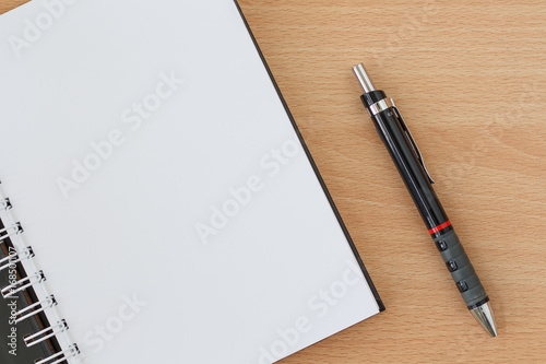 Cuadro en lienzo workspace on wood table with notebook and pen. copy space