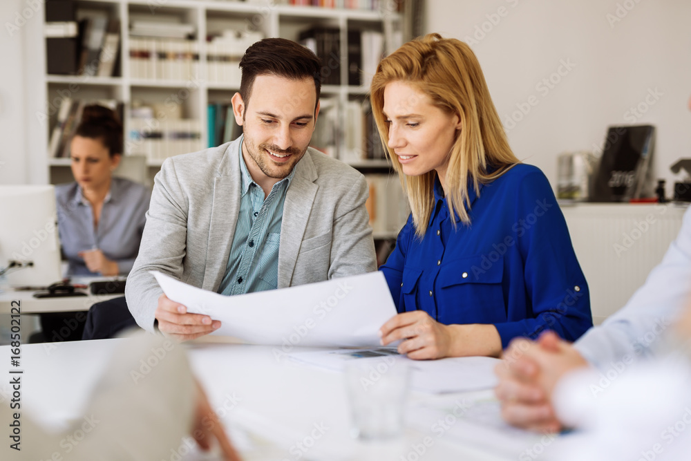 Businesspeople and architects planning Businesspeople and architects planning