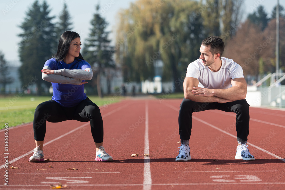 Attractive Couple Exercising Outside Attractive Couple Exercising Outside