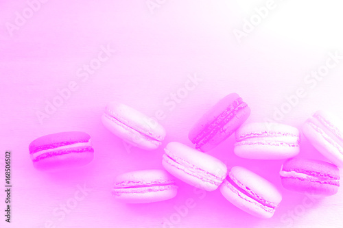 Macaroon. The bright colored rolls  cookies. The background substrate.