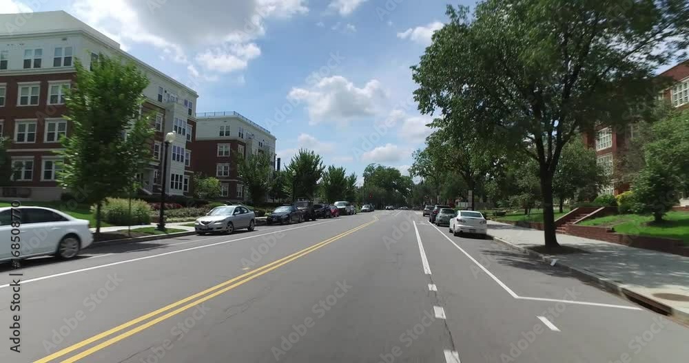 A forward perspective driving in a typical Capitol Hill business district in Washington DC.  	