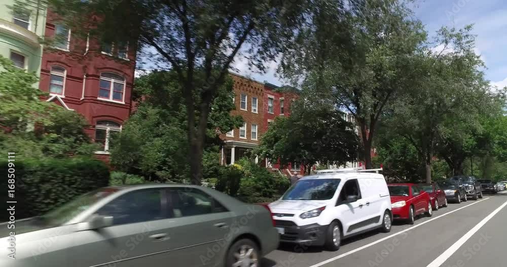 A rear profile driving perspective past typical Capitol Hill residences in Washington DC. A rear profile driving perspective past typical Capitol Hill residences in Washington DC.