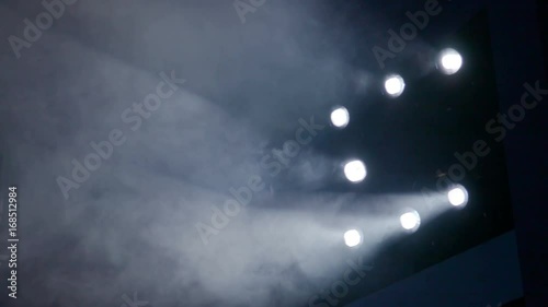 Lighting equipment on the stage. The spotlight through the smoke. Theater performance. Footage clip 4K